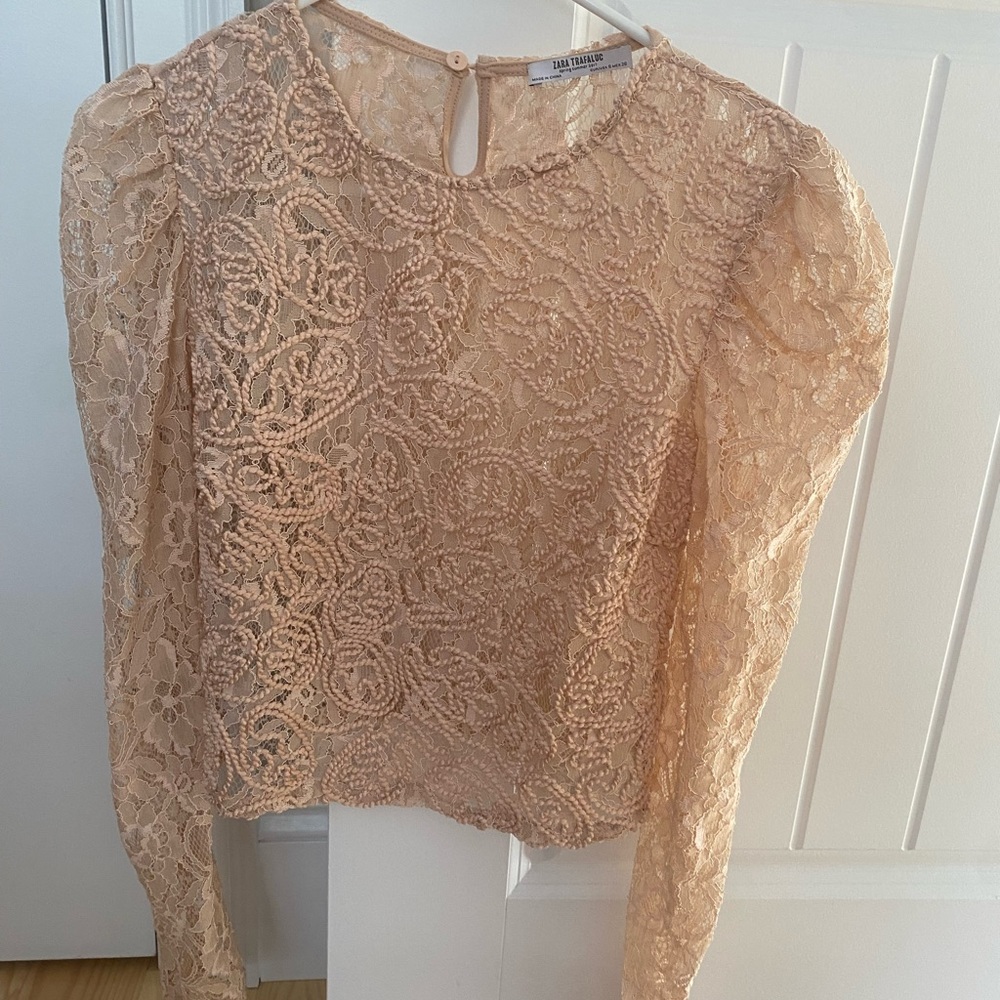 Blush colored mesh with floral design blouse